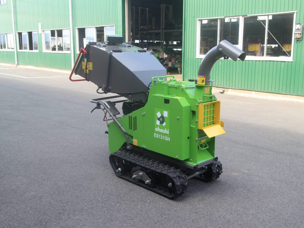 Photo of an Ohashi ES131GH 5-inch compact tracked woodchipper in a factory
