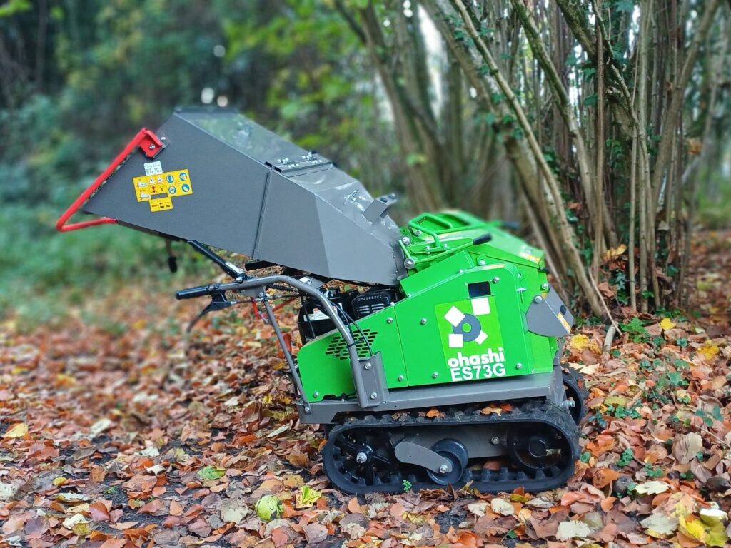 Photo of an Ohashi ES73G 3-inch compact tracked woodchipper in the woods
